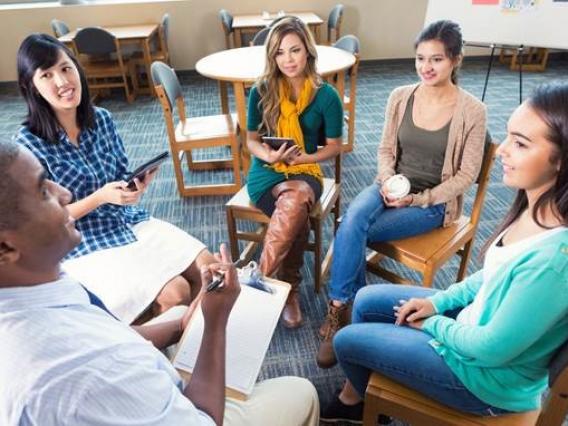 adults sitting in a circle